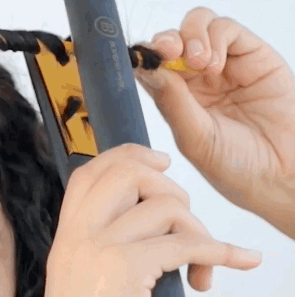 wooden pencil to create curls
