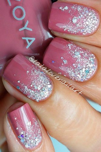 dark pink with sparkles nails