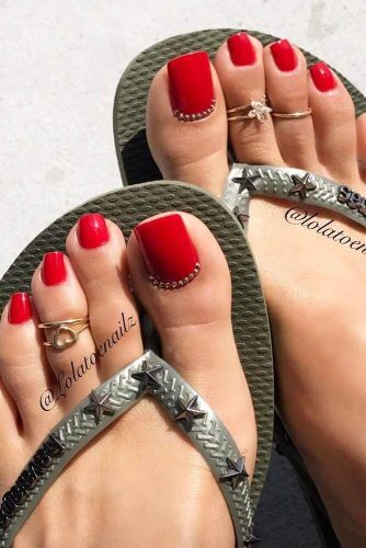 red rhinestones toe nail design